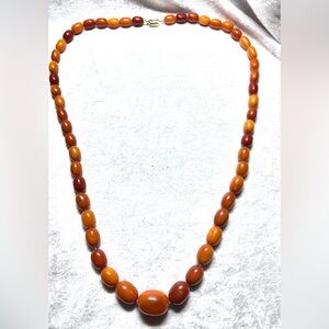 Vintage Bakelite Amber Bead 16” Necklace in butterscotch and egg yolk colors.